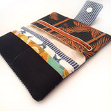 ארנק קנבס טבעוני בעבודת הדפס דקלים וציפורים – סטודיו הגמל הקטן