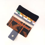 ארנק קנבס טבעוני בעבודת הדפס דקלים וציפורים – סטודיו הגמל הקטן